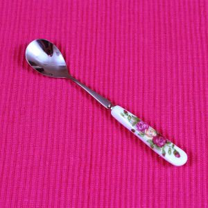 Dessert spoon with flower patterned ceramic handle ― Contieurope
